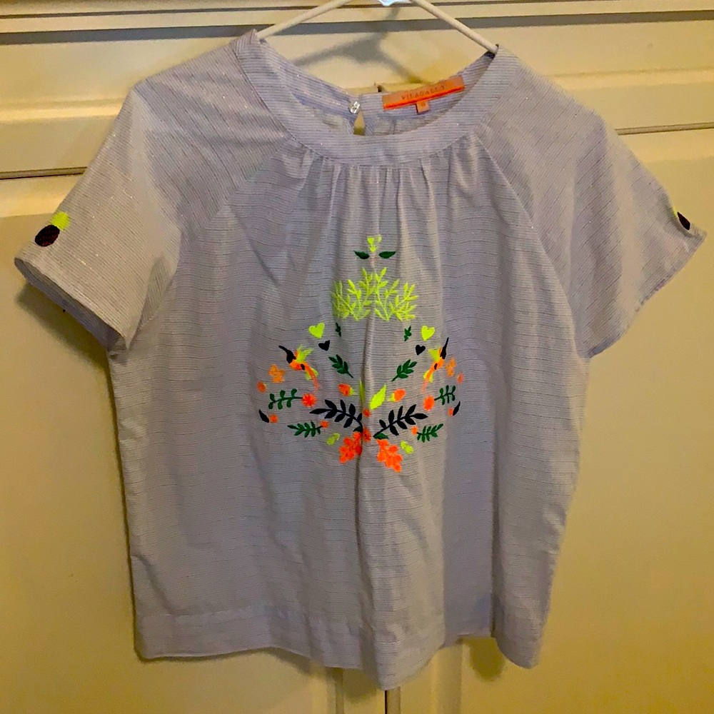 Embroidered and gold thread woven throughout
